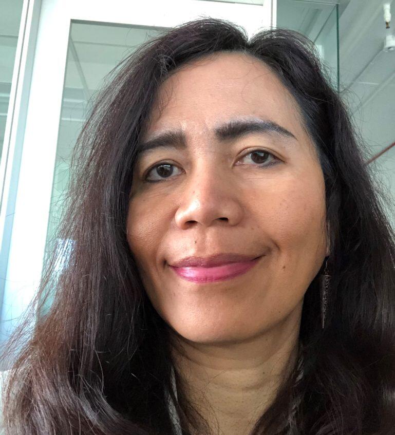 Dark Haired woman with brown eyes